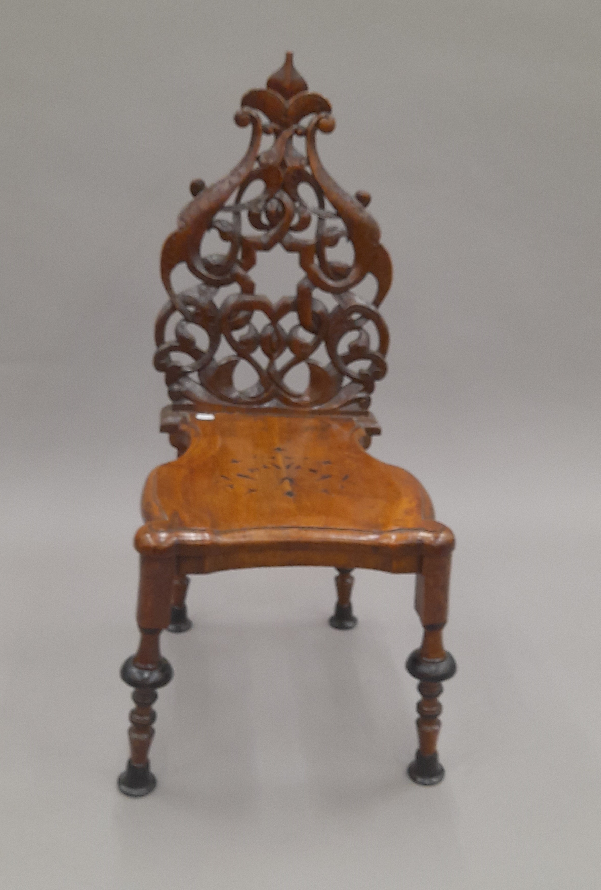 A 19th century carved hall chair. 39 cm wide. - Image 2 of 7