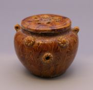 A small Chinese brown glazed pottery censer. 5 cm high.