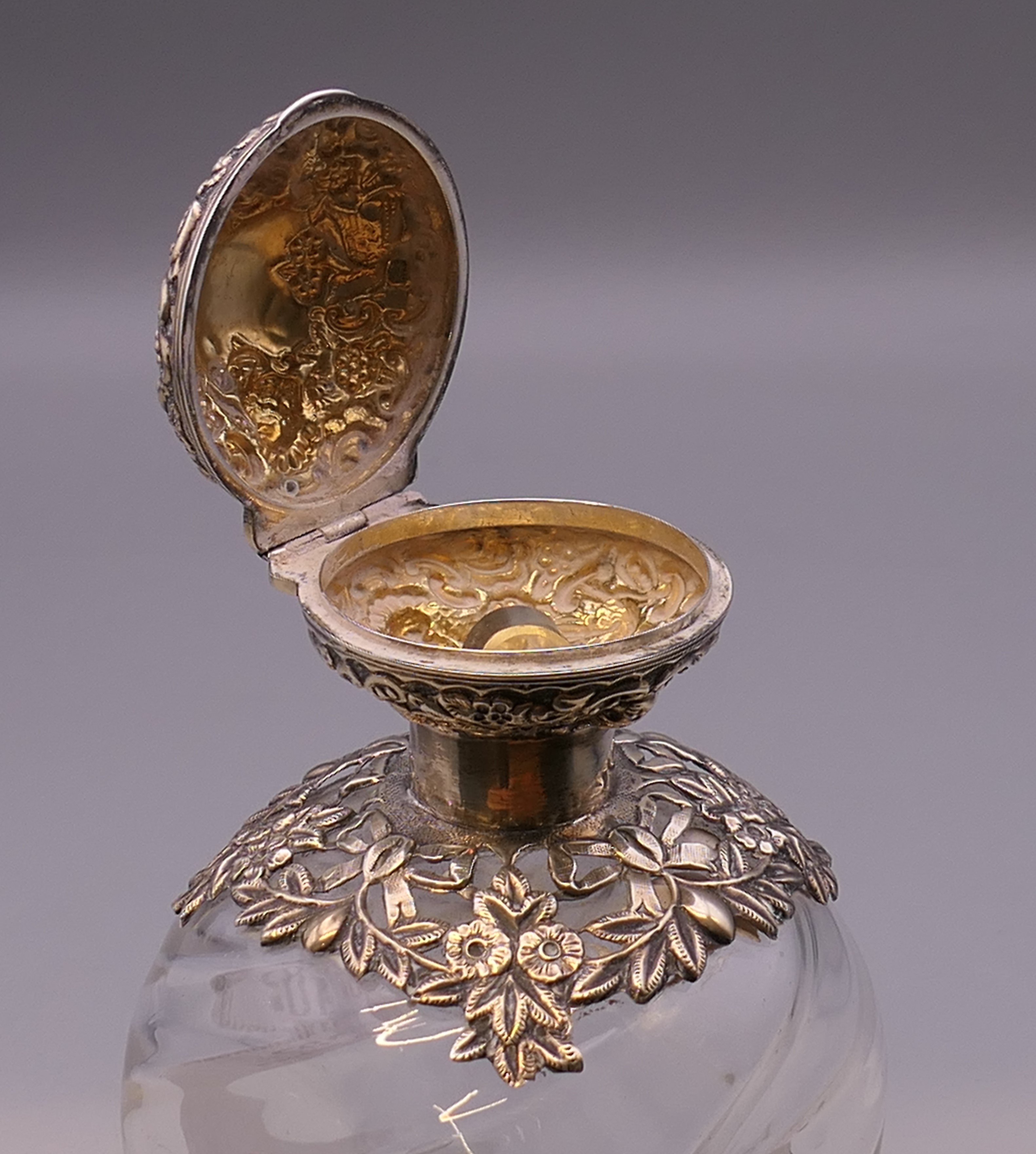 A silver topped bulbous perfume bottle. 12 cm high. - Image 4 of 7