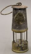 A vintage miner's lamp. 23 cm high.
