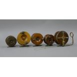 Five wooden Nottingham pattern reels.