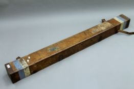 A Farlow's wooden rod box, with old rod,