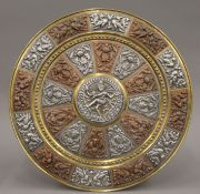 A large Indian mixed metal circular wall hanging. By repute purchased in India Between 1890-1920.