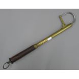 A Victorian Hardy's brass telescopic gaff with lignum handle, stamped HARDY'S ALNWICK.