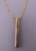 A 9 ct gold pendant and chain. The pendant 3.25 cm high. 3 grammes total weight.