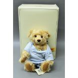 A Steiff boxed yellow tag classic teddy bear.