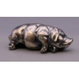 A silver model of a pig bearing Russian marks. 7 cm long. 44.6 grammes total weight.