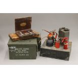 A quantity of items, including ammunition boxes, etc.