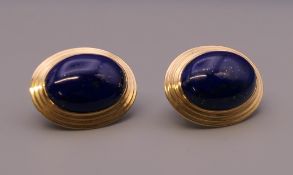 A pair of 14 ct gold and lapiz earrings. 2.5 cm high. 13.4 grammes total weight.