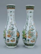 A pair of Chinese famille verte hexagonal porcelain vases. 31 cm high.