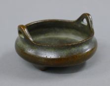 A small Chinese bronze censer. 8 cm diameter.