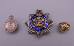 A Masonic ball and a silver enamel badge, etc.