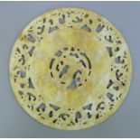 A Chinese bi disc. 27.5 cm diameter.