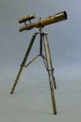 A telescope on stand. 26 cm long.