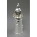 A silver plated lighthouse form cocktail shaker. 35 cm high.