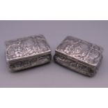 A near pair of 19th century Continental silver table snuff boxes decorated in the Rococo style,