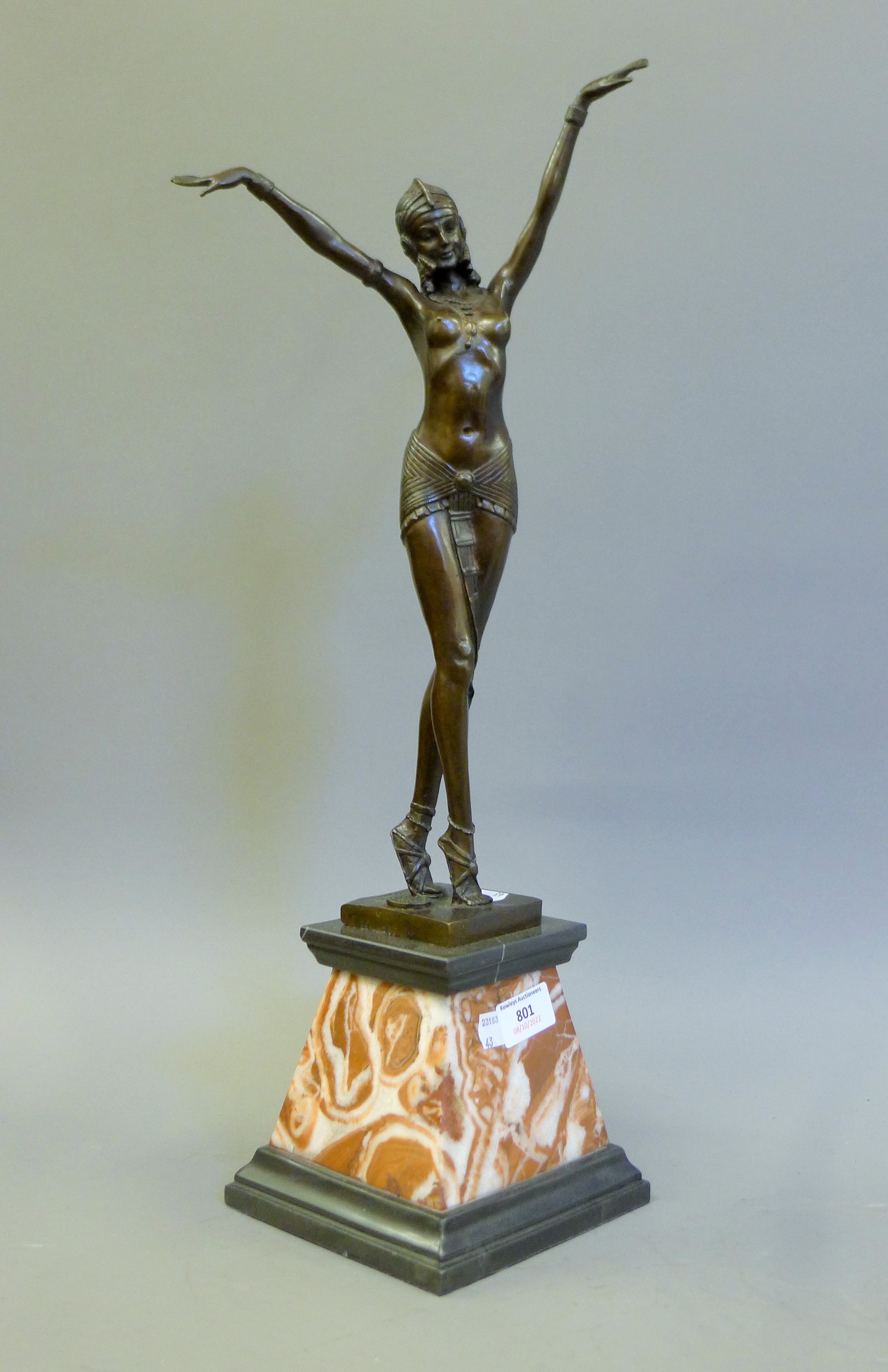 An Art Deco style bronze model of a dancer. 56 cm high.