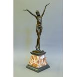 An Art Deco style bronze model of a dancer. 56 cm high.