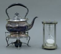A plated kettle on stand and an egg timer. The former 31 cm high.