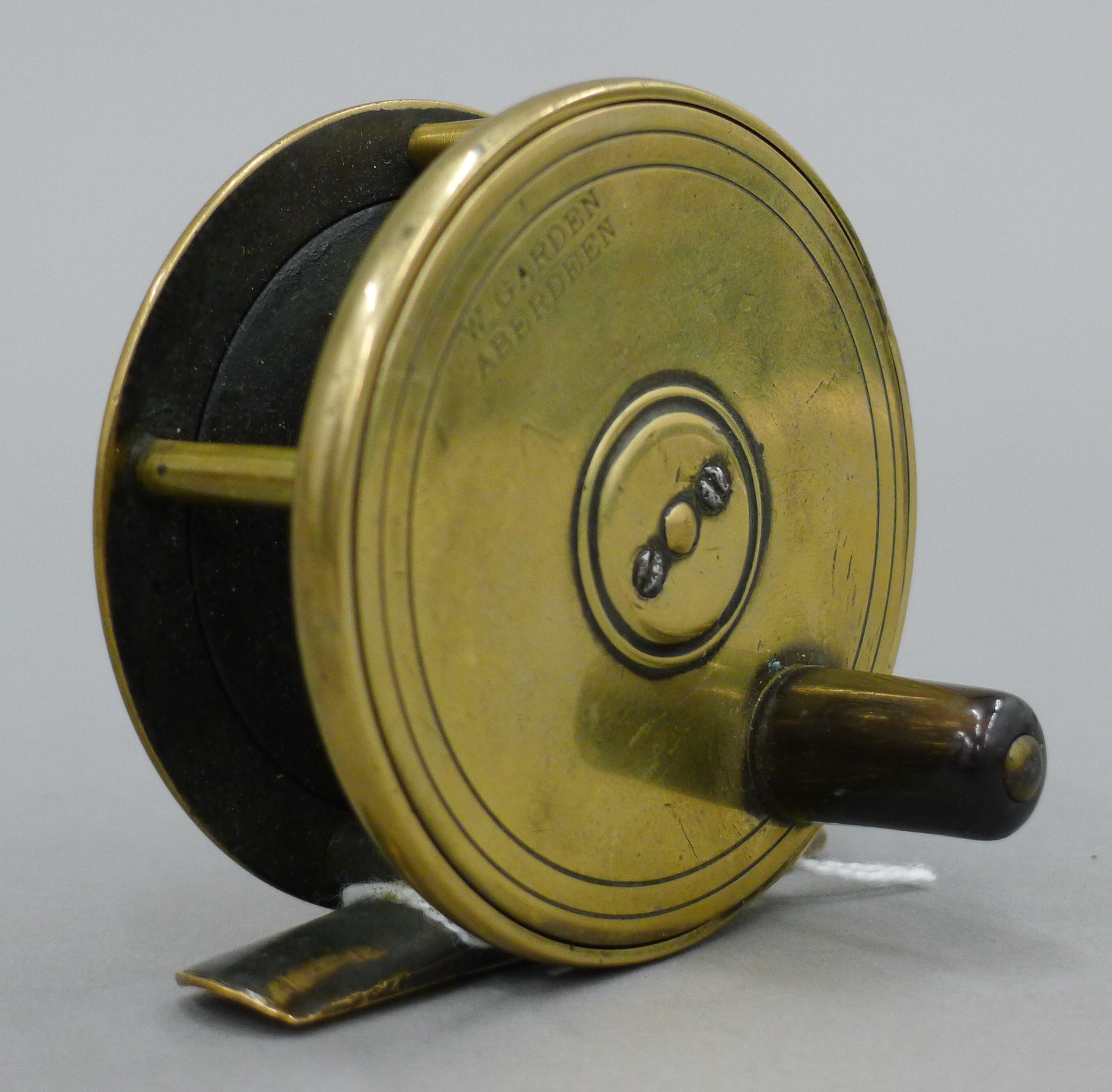A 2 1/2 '' all brass fly reel, stamped W GARDEN ABERDEEN, 1890's. - Image 3 of 4