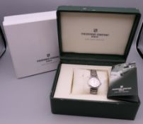 A boxed Frederique Constant wristwatch. 3 cm wide.