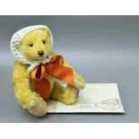 A Steiff musical teddy bear.