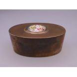 A 19th century oval copper box with hinged lid,