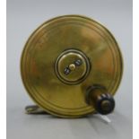 A 2 1/2 '' all brass fly reel, stamped W GARDEN ABERDEEN, 1890's.