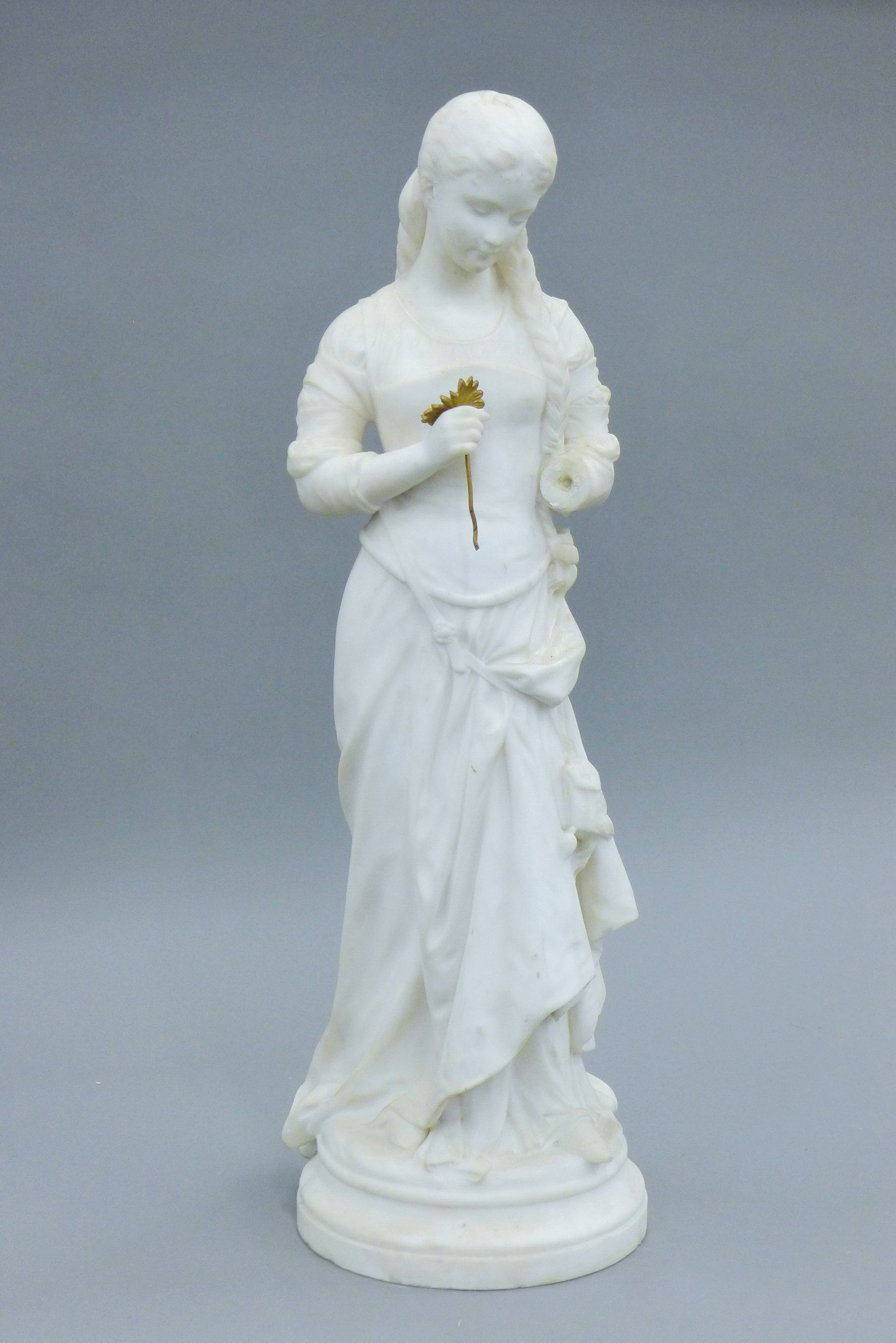 A 19th century marble model of a girl. 77 cm high.