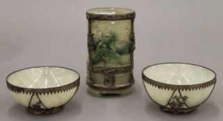 A Chinese carved brush pot and a pair of Chinese bowls, all with white metal mounts. The former 13.
