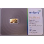 A Umicore 1 gram fine gold bar.