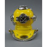 A small model of a diver's helmet. 17 cm high.