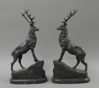 A pair of bronze stags. 43 cm high.