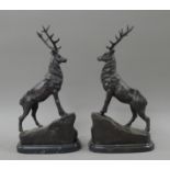 A pair of bronze stags. 43 cm high.