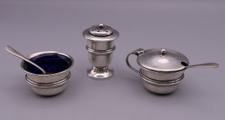 A three-piece silver cruet set. The pepper 5.5 cm high. 41.7 grammes of weighable silver.