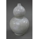 A Chinese double gourd crackle glaze porcelain vase. 22 cm high.