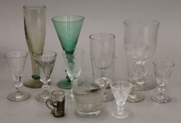 A quantity of various drinking glasses.