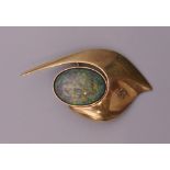 A 14 ct gold and opal brooch. 4.5 cm high. 10 grammes total weight.