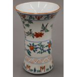 A Chinese porcelain polychrome decorated vase in Transitional/Late Ming style. 24 cm high.