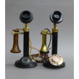 Two original candlestick telephones.