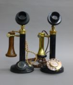 Two original candlestick telephones.