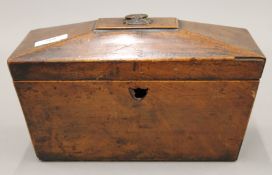 A 19th century mahogany tea caddy. 28 cm wide.