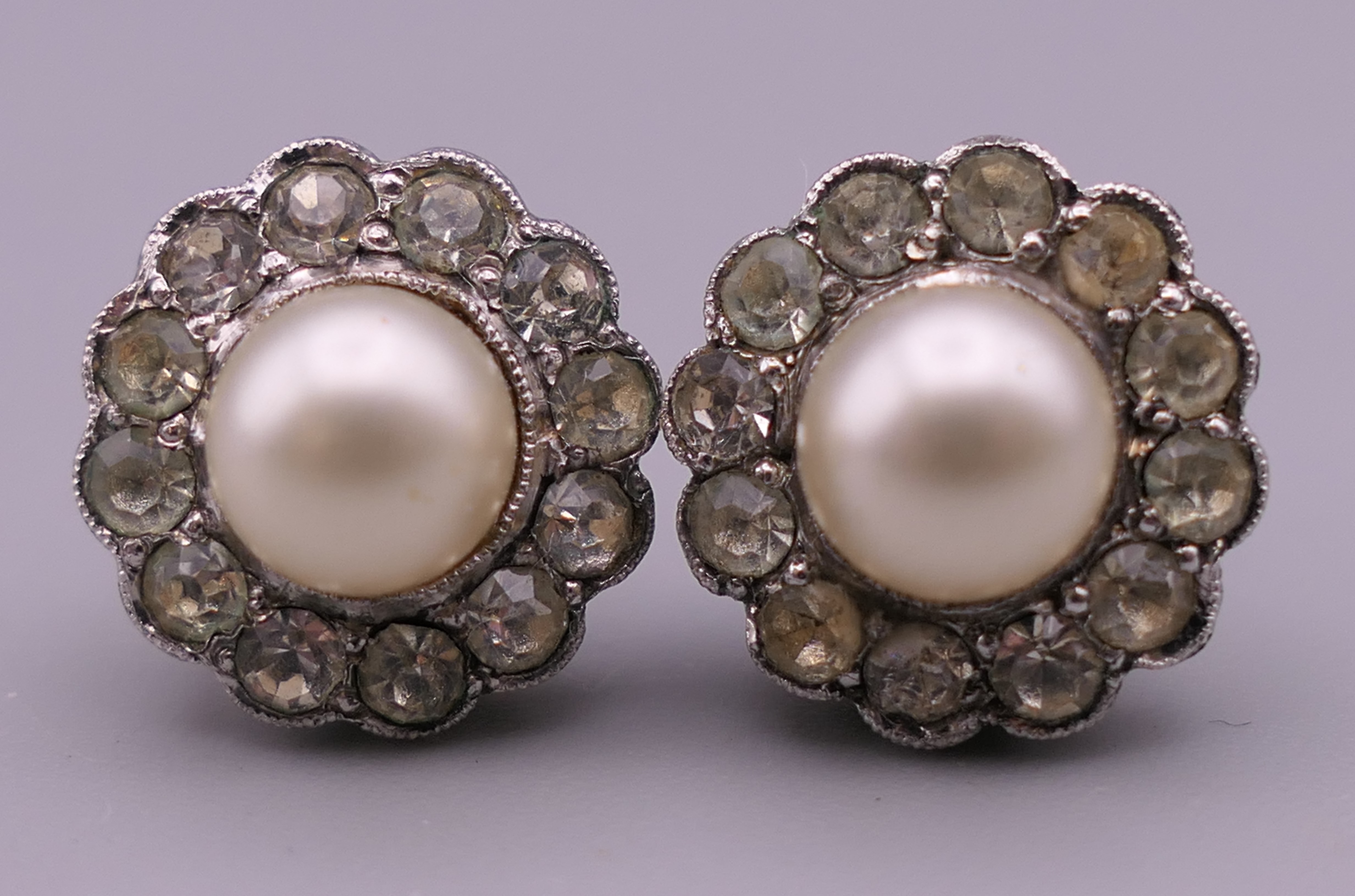 A pair of Ciro of London 9 ct gold mounted earrings. 1 cm diameter.