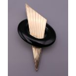A 14 K gold and black jet Art Deco style brooch. 8.5 cm long. 24.2 grammes total weight.