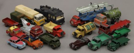 A quantity of vintage Dinky and other toys.