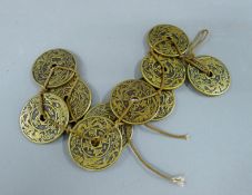 A string of Chinese coins.