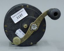 A Penn No249 deep sea fishing reel.