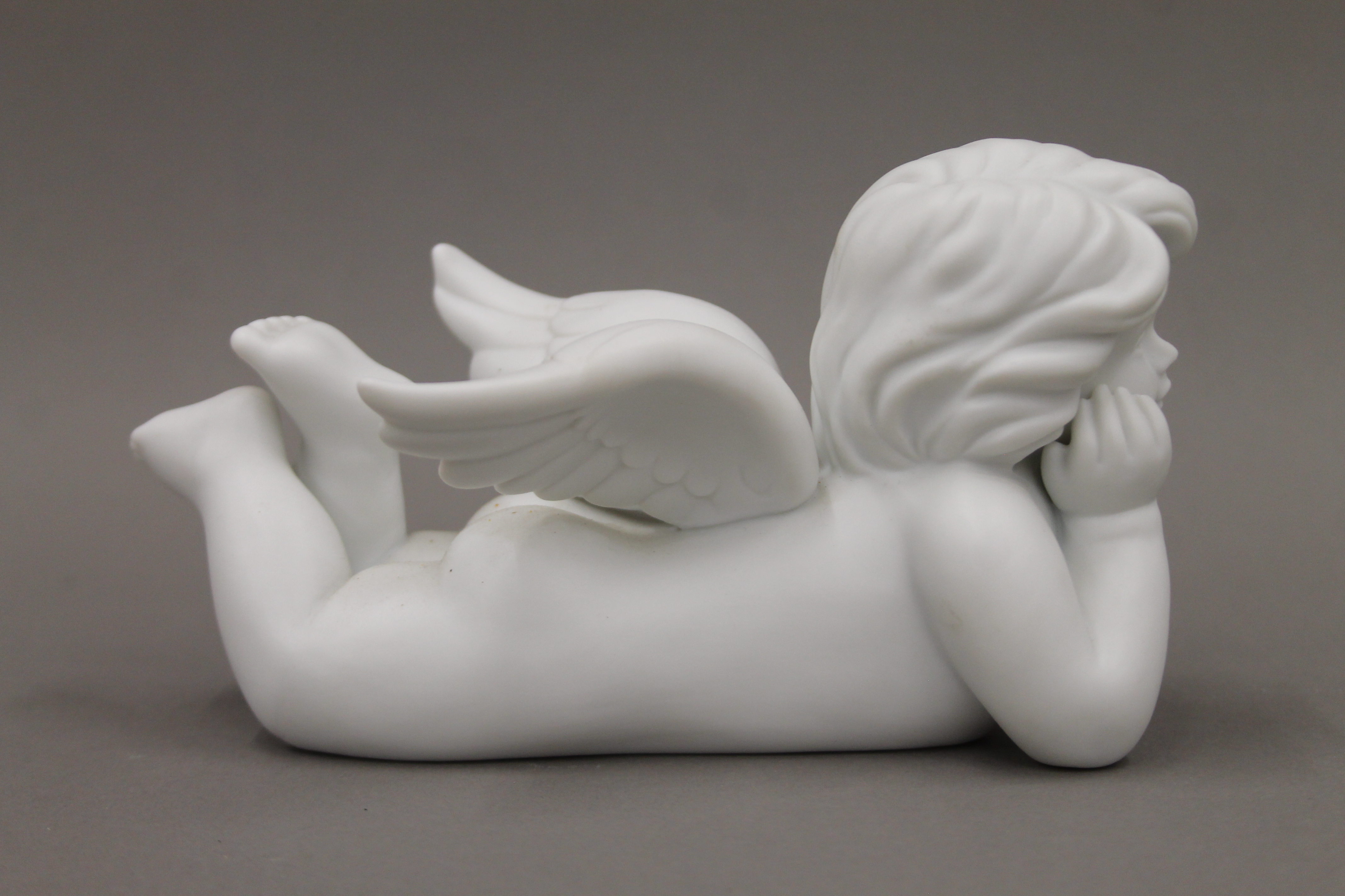 A Rosenthal bisque model of a cherub. 17 cm long. - Image 3 of 4