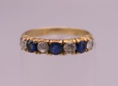 A 14 ct gold dress ring. Ring size K. 1.9 grammes total weight.