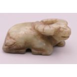 A jade model of a water buffalo. 5.5 cm long.